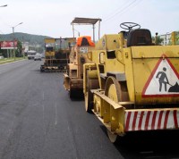 Реконструкция автодороги в поселке Коммунарка завершится во II квартале 2015г.